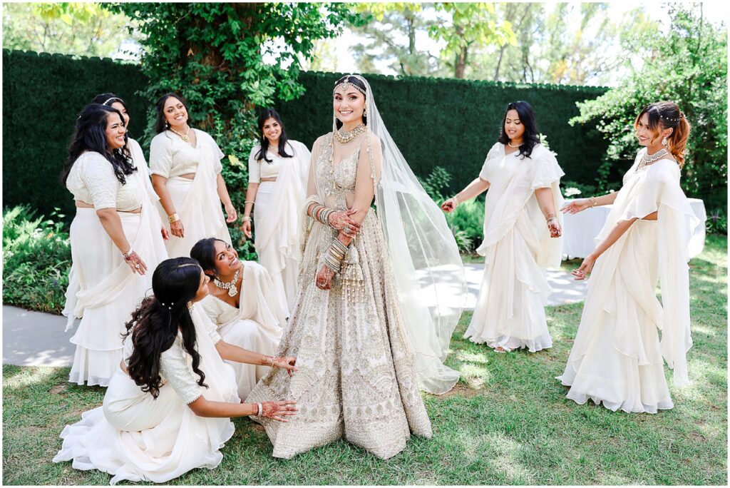 A joyful and colorful baraat procession with energetic dancing, live drummers, and a happy groom celebrating in style!